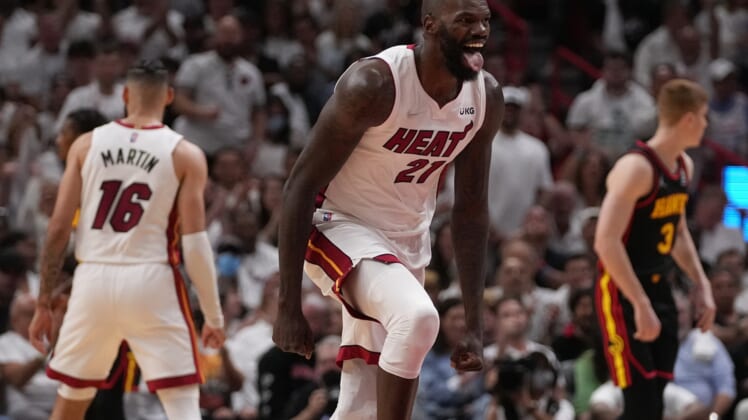 Apr 19, 2022; Miami, Florida, USA; Miami Heat center Dewayne Dedmon (21) reacts after scoring against the Atlanta Hawks during the second half in game two of the first round for the 2022 NBA playoffs at FTX Arena. Mandatory Credit: Jasen Vinlove-USA TODAY Sports
