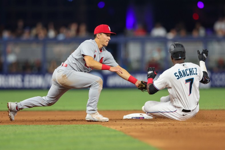 Apr 19, 2022; Miami, Florida, USA;  St. Louis Cardinals second baseman Tommy Edman (19) picks off Miami Marlins right fielder Jesus Sanchez (7) in the seventh inning at loanDepot Park. Mandatory Credit: Nathan Ray Seebeck-USA TODAY Sports