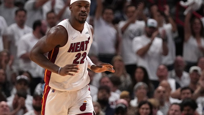 Apr 19, 2022; Miami, Florida, USA; Miami Heat forward Jimmy Butler (22) reacts after scoring against the Atlanta Hawks during the second half in game two of the first round for the 2022 NBA playoffs at FTX Arena. Mandatory Credit: Jasen Vinlove-USA TODAY Sports