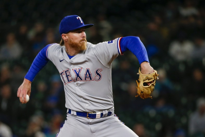 Apr 19, 2022; Seattle, Washington, USA; Texas Rangers starting pitcher Jon Gray (22) throws against the Seattle Mariners during the fourth inning at T-Mobile Park. Mandatory Credit: Joe Nicholson-USA TODAY Sports
