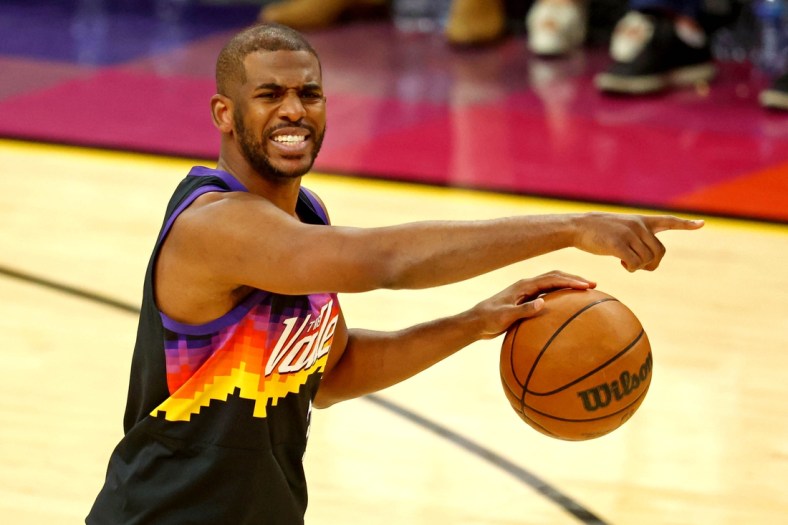 Apr 19, 2022; Phoenix, Arizona, USA; Phoenix Suns guard Chris Paul (3) handles the ball during the third quarter against the New Orleans Pelicans during game two of the first round for the 2022 NBA playoffs at Footprint Center. Mandatory Credit: Mark J. Rebilas-USA TODAY Sports