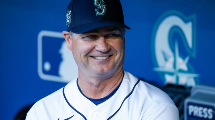 Apr 15, 2022; Seattle, Washington, USA; Seattle Mariners manager Scott Servais (9) stands in the dugout before a game against the Houston Astros at T-Mobile Park. Mandatory Credit: Joe Nicholson-USA TODAY Sports