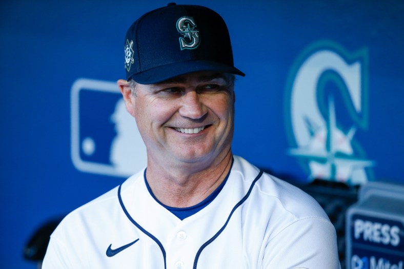 Apr 15, 2022; Seattle, Washington, USA; Seattle Mariners manager Scott Servais (9) stands in the dugout before a game against the Houston Astros at T-Mobile Park. Mandatory Credit: Joe Nicholson-USA TODAY Sports