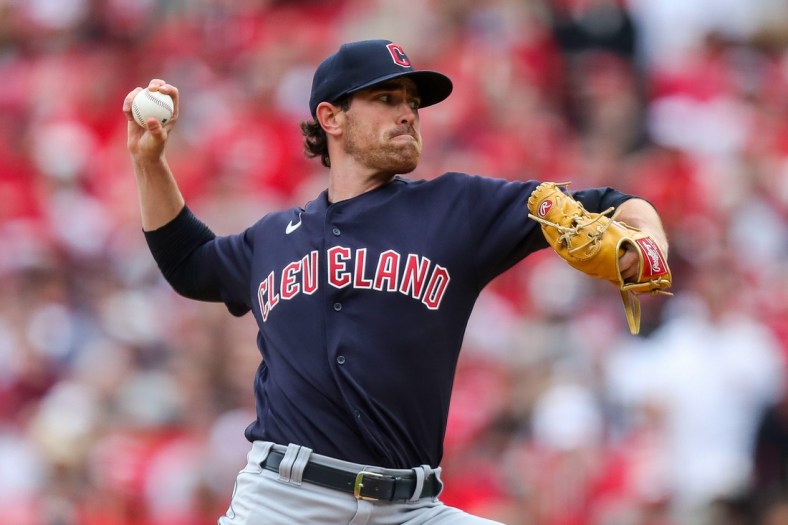 Apr 12, 2022; Cincinnati, Ohio, USA; Cleveland Guardians starting pitcher Shane Bieber (57) throws a pitch against the Cincinnati Reds in the first inning at Great American Ball Park. Mandatory Credit: Katie Stratman-USA TODAY Sports