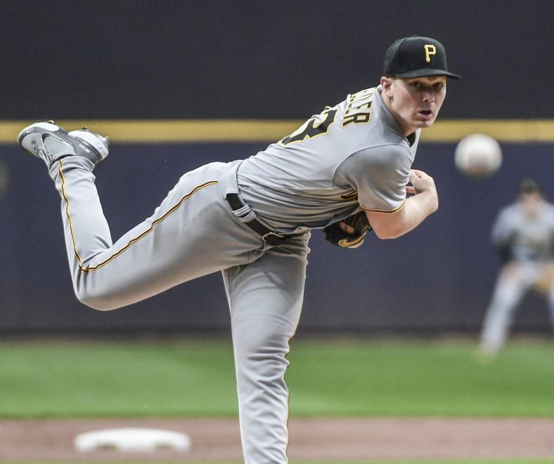 Apr 20, 2022; Milwaukee, Wisconsin, USA;  Pittsburgh Pirates pitcher Mitch Keller (23) throws a pitch in the first inning against the Milwaukee Brewers at American Family Field. Mandatory Credit: Benny Sieu-USA TODAY Sports