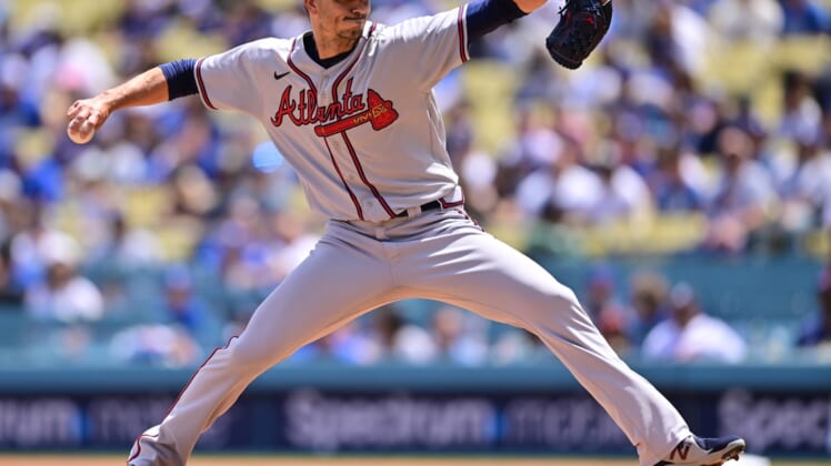 Apr 20, 2022; Los Angeles, California, USA;  Atlanta Braves starting pitcher Charlie Morton (50) pitches in the first inning of the game against the Los Angeles Dodgers at Dodger Stadium. Mandatory Credit: Jayne Kamin-Oncea-USA TODAY Sports