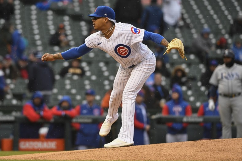 Apr 20, 2022; Chicago, Illinois, USA;  Chicago Cubs starting pitcher Marcus Stroman (0) delivers against the Tampa Bay Rays during the first inning at Wrigley Field. Mandatory Credit: Matt Marton-USA TODAY Sports