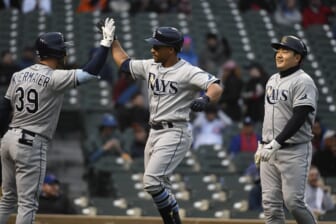 Apr 20, 2022; Chicago, Illinois, USA;  Tampa Bay Rays catcher Francisco Mejia (21) celebrates with Tampa Bay Rays center fielder Kevin Kiermaier (39) after Mejia hits a two-run home run against the Chicago Cubs during the first inning at Wrigley Field. Mandatory Credit: Matt Marton-USA TODAY Sports