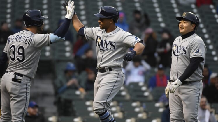 Apr 20, 2022; Chicago, Illinois, USA;  Tampa Bay Rays catcher Francisco Mejia (21) celebrates with Tampa Bay Rays center fielder Kevin Kiermaier (39) after Mejia hits a two-run home run against the Chicago Cubs during the first inning at Wrigley Field. Mandatory Credit: Matt Marton-USA TODAY Sports