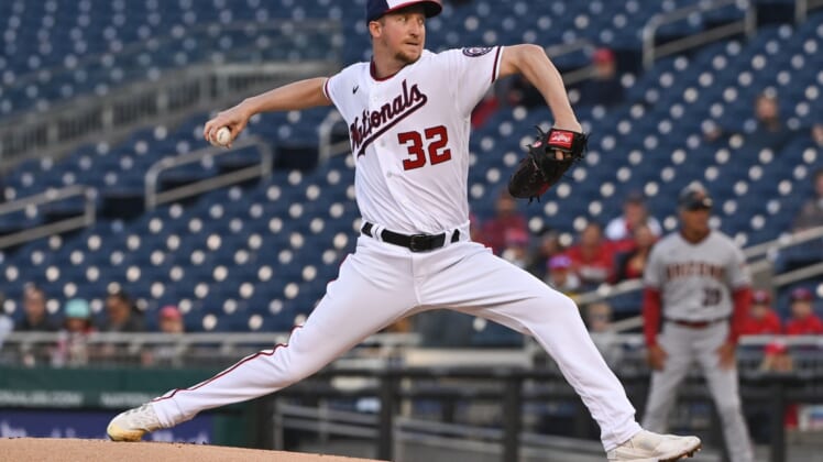 Apr 20, 2022; Washington, District of Columbia, USA;  Washington Nationals starting pitcher Erick Fedde (32) delivers a first inning pitch against the Arizona Diamondbacks at Nationals Park. Mandatory Credit: Tommy Gilligan-USA TODAY Sports