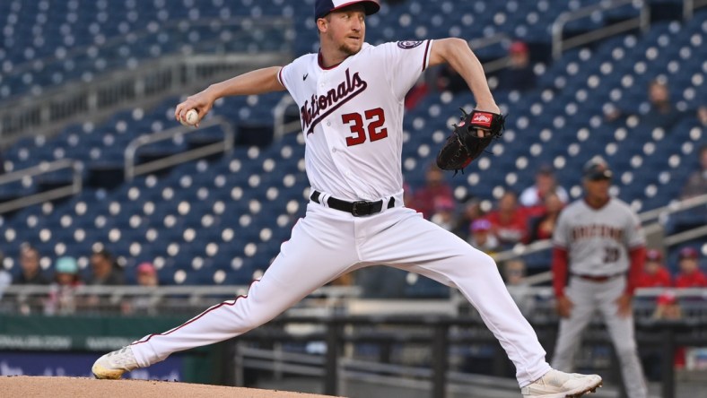 Apr 20, 2022; Washington, District of Columbia, USA;  Washington Nationals starting pitcher Erick Fedde (32) delivers a first inning pitch against the Arizona Diamondbacks at Nationals Park. Mandatory Credit: Tommy Gilligan-USA TODAY Sports