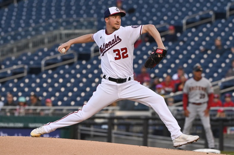 Apr 20, 2022; Washington, District of Columbia, USA;  Washington Nationals starting pitcher Erick Fedde (32) delivers a first inning pitch against the Arizona Diamondbacks at Nationals Park. Mandatory Credit: Tommy Gilligan-USA TODAY Sports