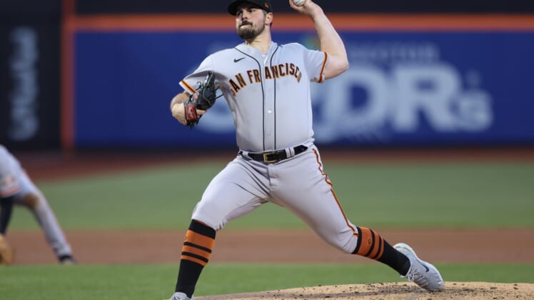 Apr 20, 2022; New York City, New York, USA; San Francisco Giants starting pitcher Carlos Rodon (16) delivers a pitch during the first inning against the New York Mets at Citi Field. Mandatory Credit: Vincent Carchietta-USA TODAY Sports