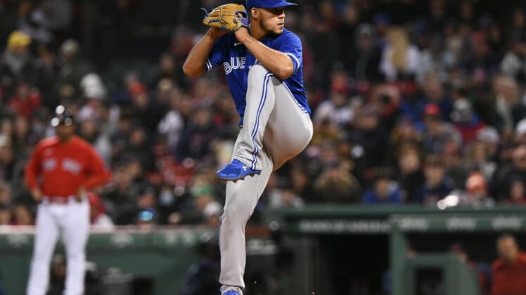 Apr 20, 2022; Boston, Massachusetts, USA; Toronto Blue Jays starting pitcher Jose Berrios (17) pitches against the Boston Red Sox during the third inning at Fenway Park. Mandatory Credit: Brian Fluharty-USA TODAY Sports