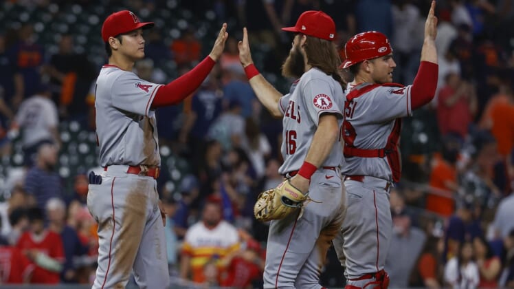 Apr 20, 2022; Houston, Texas, USA; Los Angeles Angels starting pitcher Shohei Ohtani (17) celebrates with teammates after the Angels defeated the Houston Astros at Minute Maid Park. Mandatory Credit: Troy Taormina-USA TODAY Sports
