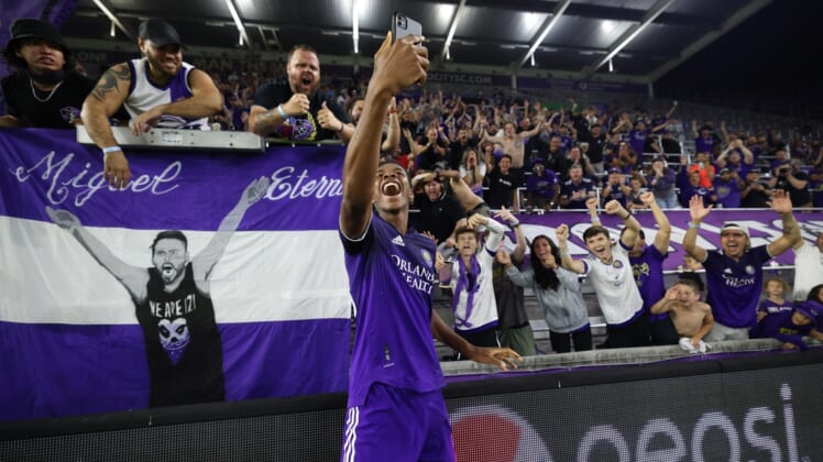Apr 20, 2022; Orlando, Florida, USA;  Orlando City defender Thomas Williams (68) celebrates after beating the Tampa Bay Rowdies in a US Open Cup match at Exploria Stadium. Mandatory Credit: Nathan Ray Seebeck-USA TODAY Sports