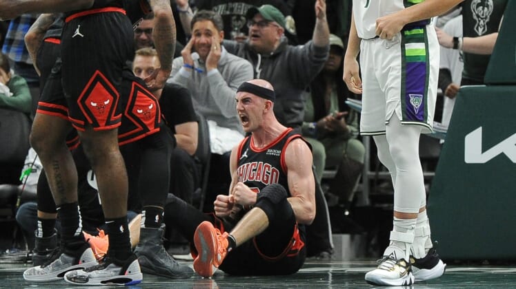 Apr 20, 2022; Milwaukee, Wisconsin, USA; Chicago Bulls guard Alex Caruso (6) celebrates a 114-110 win over the Milwaukee Bucks during game two of the first round for the 2022 NBA playoffs at Fiserv Forum. Mandatory Credit: Michael McLoone-USA TODAY Sports