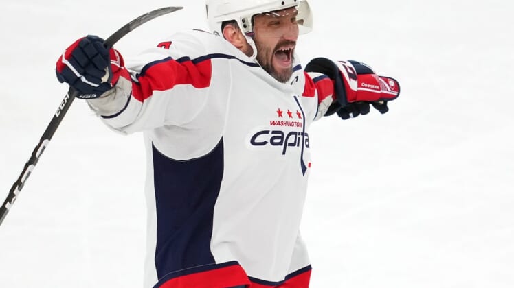 Apr 20, 2022; Las Vegas, Nevada, USA; Washington Capitals left wing Alex Ovechkin (8) celebrates after scoring his 50th goal of the season during the third period against the Vegas Golden Knights at T-Mobile Arena. Mandatory Credit: Stephen R. Sylvanie-USA TODAY Sports