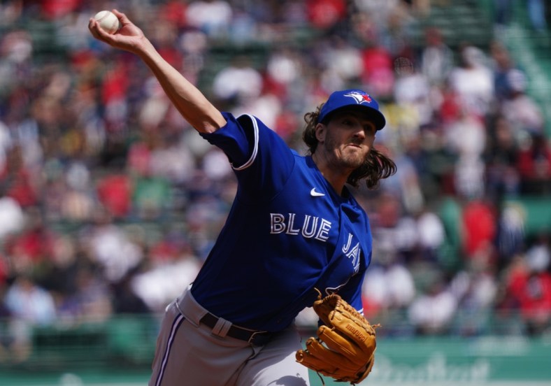 Apr 21, 2022; Boston, Massachusetts, USA; Toronto Blue Jays starting pitcher Kevin Gausman (34) throws a pitch against the Boston Red Sox in the first inning at Fenway Park. Mandatory Credit: David Butler II-USA TODAY Sports
