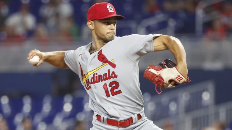 Apr 21, 2022; Miami, Florida, USA; St. Louis Cardinals pitcher Jordan Hicks (12) throws during the first inning against the Miami Marlins at loanDepot Park. Mandatory Credit: Rhona Wise-USA TODAY Sports