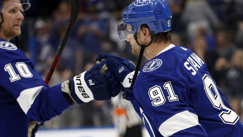 Apr 21, 2022; Tampa, Florida, USA; Tampa Bay Lightning center Steven Stamkos (91) celebrates as they beat the Toronto Maple Leafs at Amalie Arena. Mandatory Credit: Kim Klement-USA TODAY Sports