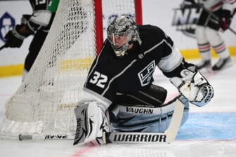 Apr 21, 2022; Los Angeles, California, USA;Los Angeles Kings goaltender Jonathan Quick (32) defends the goal against the Chicago Blackhawks during the first period at Crypto.com Arena. Mandatory Credit: Gary A. Vasquez-USA TODAY Sports