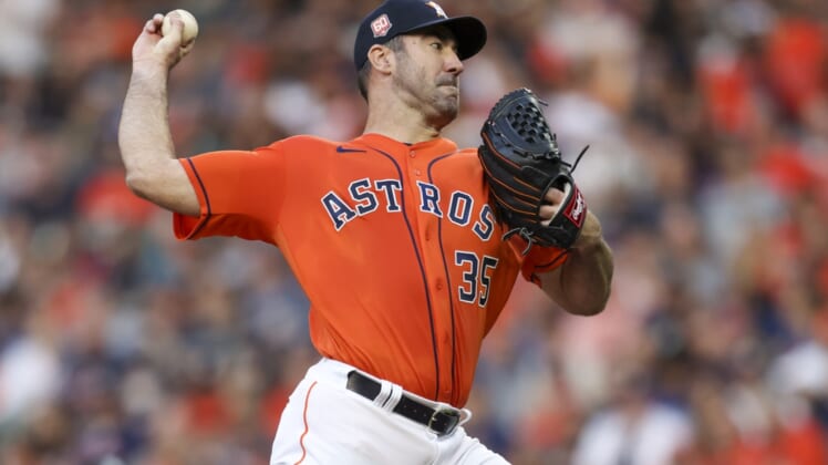Apr 22, 2022; Houston, Texas, USA; Houston Astros starting pitcher Justin Verlander (35) pitches against the Toronto Blue Jays in the first inning  at Minute Maid Park. Mandatory Credit: Thomas Shea-USA TODAY Sports