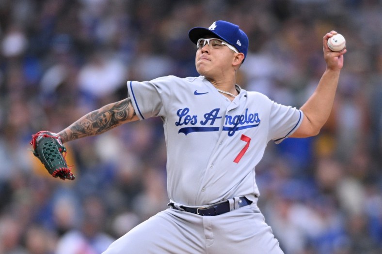 Apr 22, 2022; San Diego, California, USA; Los Angeles Dodgers starting pitcher Julio Urias (7) throws a pitch against the San Diego Padres during the first inning at Petco Park. Mandatory Credit: Orlando Ramirez-USA TODAY Sports