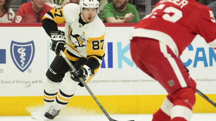Apr 23, 2022; Detroit, Michigan, USA; Pittsburgh Penguins center Sidney Crosby (87) skates with the puck during the first period against the Detroit Red Wings at Little Caesars Arena. Mandatory Credit: Raj Mehta-USA TODAY Sports