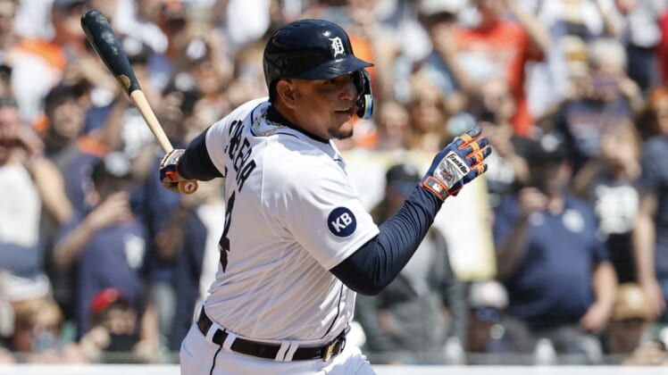 Apr 23, 2022; Detroit, Michigan, USA; Detroit Tigers designated hitter Miguel Cabrera (24) hits a single for his 3000th career hit in the first inning against the Colorado Rockies at Comerica Park. Mandatory Credit: Rick Osentoski-USA TODAY Sports