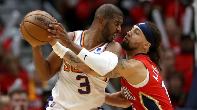 Apr 22, 2022; New Orleans, Louisiana, USA; Phoenix Suns guard Chris Paul (3) is defended by New Orleans Pelicans guard Jose Alvarado (15) in the second quarter of game three of the first round for the 2022 NBA playoffs at the Smoothie King Center. Mandatory Credit: Chuck Cook-USA TODAY Sports