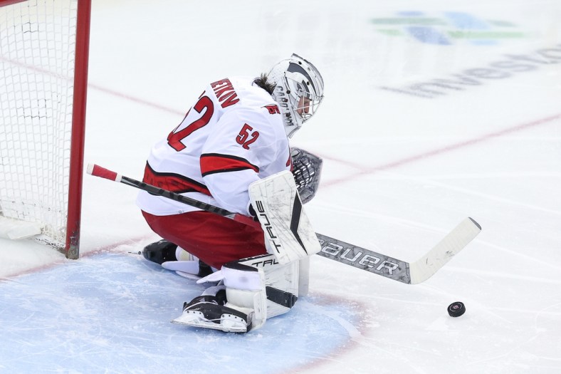 Apr 23, 2022; Newark, New Jersey, USA; Carolina Hurricanes goaltender Pyotr Kochetkov (52) makes a save against the New Jersey Devils during the second period at Prudential Center. Mandatory Credit: Vincent Carchietta-USA TODAY Sports