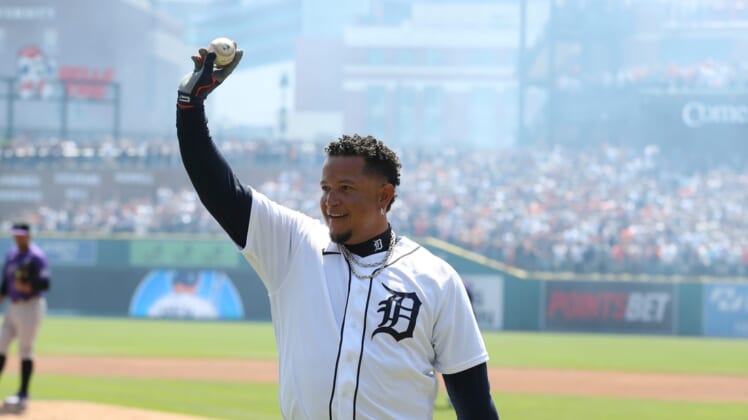 Detroit Tigers DH Miguel Cabrera (24) celebrates his 3000 hit against Colorado Rockies starting pitcher Antonio Senzatela (49) during first inning action Saturday, April 23, 2022 at Comerica Park.Tigers Col1