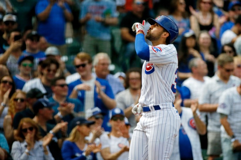Apr 23, 2022; Chicago, Illinois, USA; Chicago Cubs first baseman Alfonso Rivas (36) reacts after hitting a three-run home run against the Pittsburgh Pirates during the second inning at Wrigley Field. Mandatory Credit: Jon Durr-USA TODAY Sports