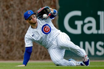 Apr 23, 2022; Chicago, Illinois, USA; Chicago Cubs left fielder Ian Happ (8) makes a catch for an out on a fly ball hit by Pittsburgh Pirates third baseman Michael Chavis (not pictured) during the first inning at Wrigley Field. Mandatory Credit: Jon Durr-USA TODAY Sports