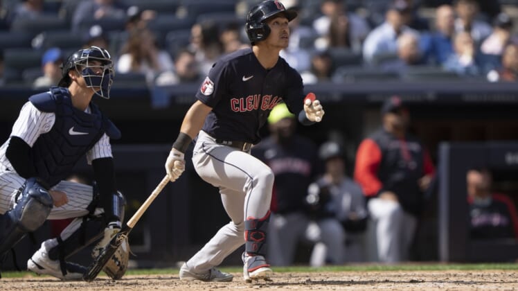 Apr 23, 2022; Bronx, New York, USA; Cleveland Guardians center fielder Steven Kwan (38) hits a fly ball against the New York Yankees during the eighth inning at Yankee Stadium. Mandatory Credit: Gregory Fisher-USA TODAY Sports