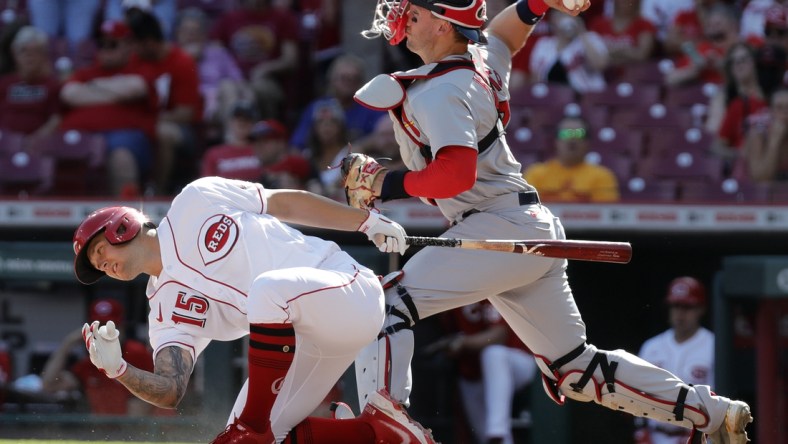 Apr 23, 2022; Cincinnati, Ohio, USA; St. Louis Cardinals catcher Andrew Knizner (right) throws to second base for an out against the Cincinnati Reds during the second inning at Great American Ball Park. Mandatory Credit: David Kohl-USA TODAY Sports