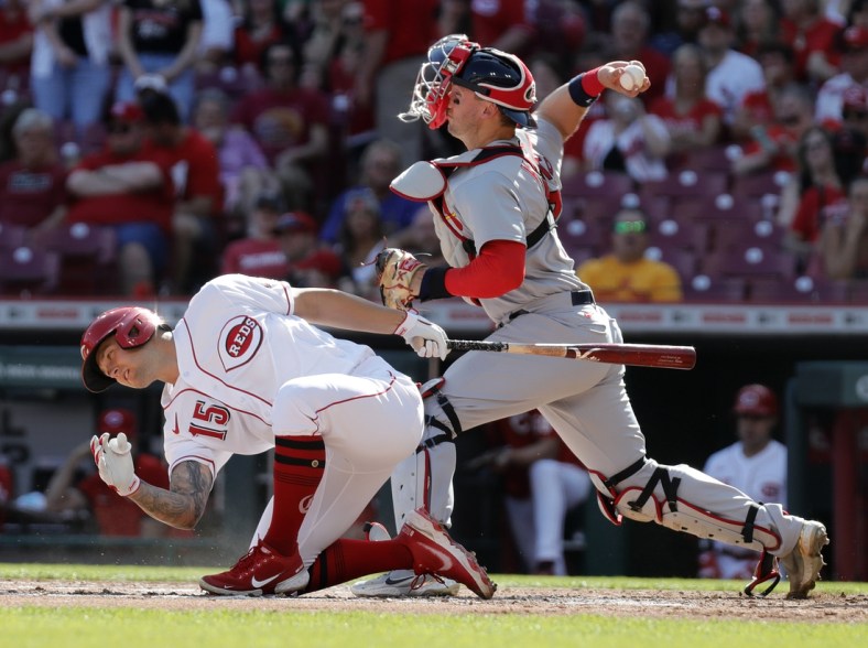 Apr 23, 2022; Cincinnati, Ohio, USA; St. Louis Cardinals catcher Andrew Knizner (right) throws to second base for an out against the Cincinnati Reds during the second inning at Great American Ball Park. Mandatory Credit: David Kohl-USA TODAY Sports