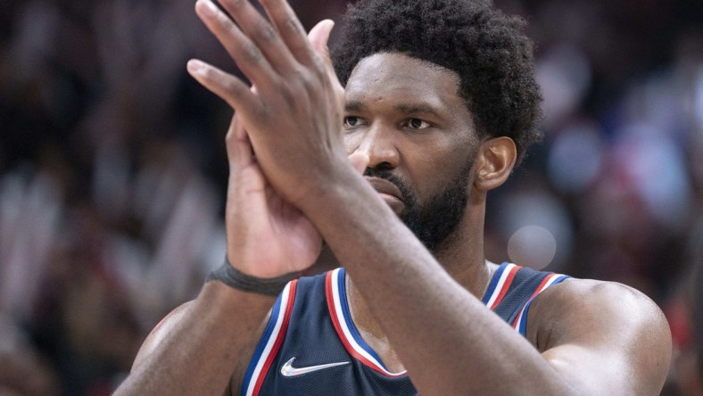 Apr 23, 2022; Toronto, Ontario, CAN; Philadelphia 76ers center Joel Embiid (21) gestures to the referees at the end of the fourth quarter of game four of the first round for the 2022 NBA playoffs against the Toronto Raptors at Scotiabank Arena. Mandatory Credit: Nick Turchiaro-USA TODAY Sports