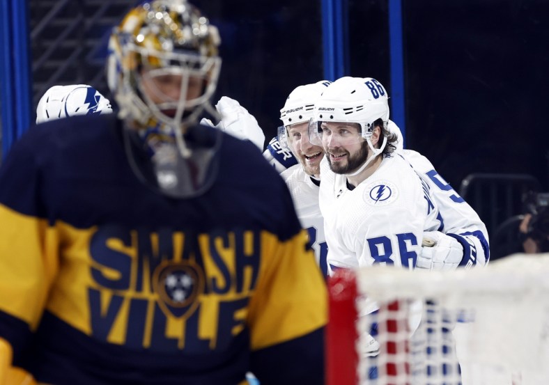 Apr 23, 2022; Tampa, Florida, USA; Tampa Bay Lightning center Steven Stamkos (91) is congratulated by right wing Nikita Kucherov (86) as he scores a goal against the Nashville Predators during the second period at Amalie Arena. Mandatory Credit: Kim Klement-USA TODAY Sports