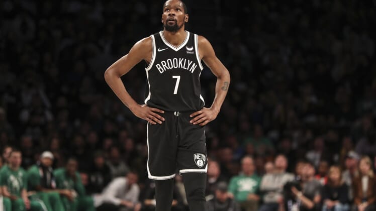 Apr 23, 2022; Brooklyn, New York, USA;  Brooklyn Nets forward Kevin Durant (7) looks up at the scoreboard in the third quarter against the Boston Celtics at Barclays Center. Mandatory Credit: Wendell Cruz-USA TODAY Sports