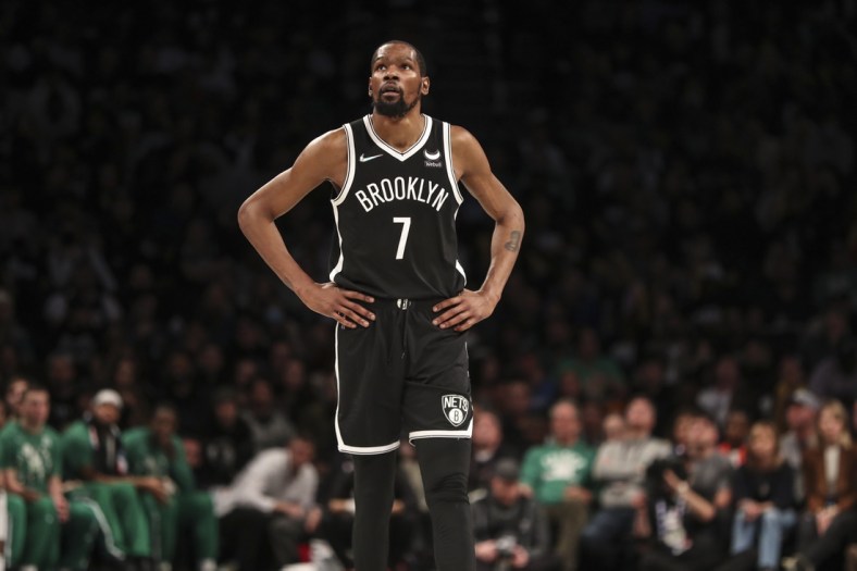 Apr 23, 2022; Brooklyn, New York, USA;  Brooklyn Nets forward Kevin Durant (7) looks up at the scoreboard in the third quarter against the Boston Celtics at Barclays Center. Mandatory Credit: Wendell Cruz-USA TODAY Sports