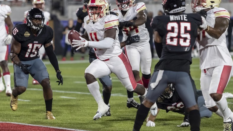 Apr 23, 2022; Birmingham, AL, USA; Birmingham Stallions running back CJ Marable (11) runs the ball for a touchdown against the Houston Gamblers during the second half at Protective Stadium. Mandatory Credit: Vasha Hunt-USA TODAY Sports