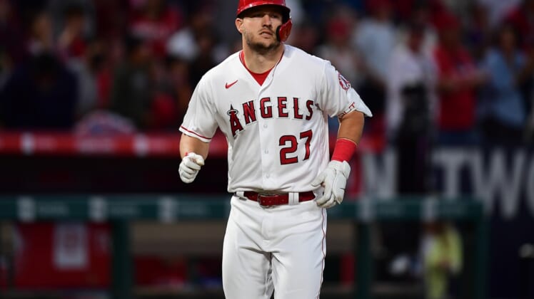 Apr 23, 2022; Anaheim, California, USA; Los Angeles Angels center fielder Mike Trout (27) reacts after hitting a solo home run against the Baltimore Orioles during the fifth inning at Angel Stadium. Mandatory Credit: Gary A. Vasquez-USA TODAY Sports