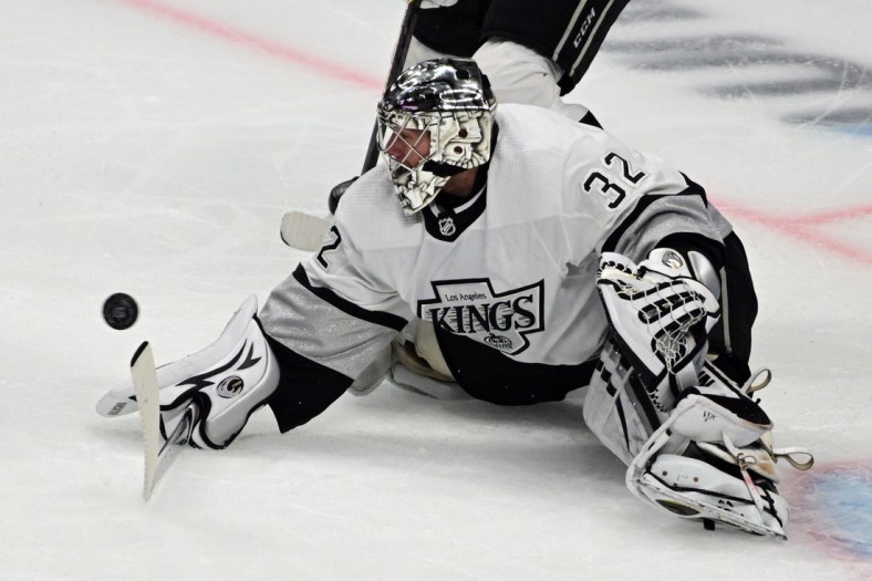 Apr 23, 2022; Los Angeles, California, USA; Los Angeles Kings goaltender Jonathan Quick (32) makes a save against the Anaheim Ducks in the first period at Crypto.com Arena. Mandatory Credit: Richard Mackson-USA TODAY Sports