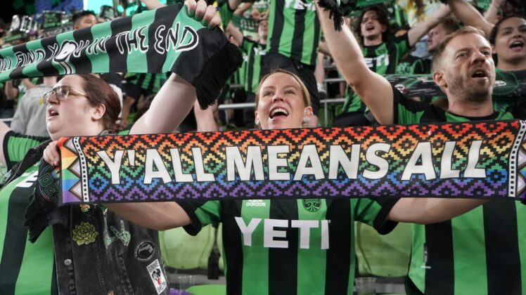 Apr 23, 2022; Austin, Texas, USA; Austin FC fans celebrate the end of their match against the Vancouver Whitecaps at Q2 Stadium. Austin FC won, 3-0. Mandatory Credit: Scott Wachter-USA TODAY Sports