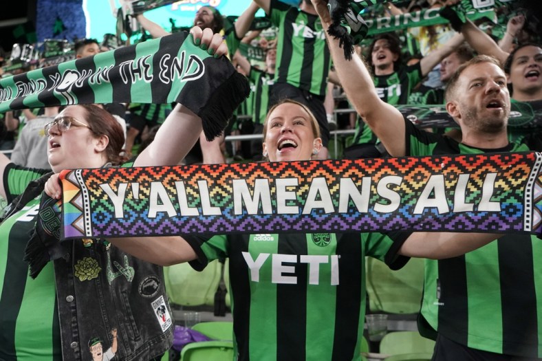 Apr 23, 2022; Austin, Texas, USA; Austin FC fans celebrate the end of their match against the Vancouver Whitecaps at Q2 Stadium. Austin FC won, 3-0. Mandatory Credit: Scott Wachter-USA TODAY Sports