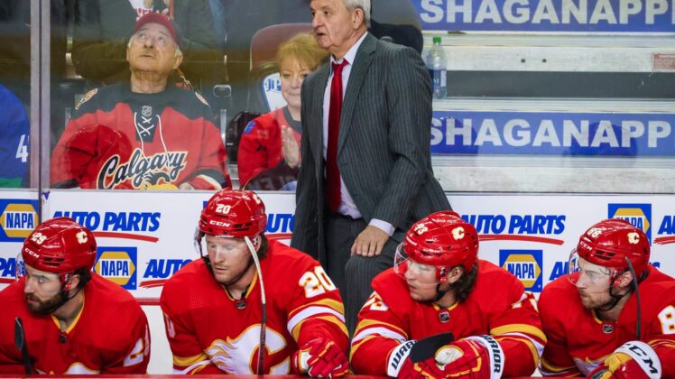 Apr 23, 2022; Calgary, Alberta, CAN; Calgary Flames head coach Darryl Sutter on his bench against the Vancouver Canucks during the first period at Scotiabank Saddledome. Mandatory Credit: Sergei Belski-USA TODAY Sports