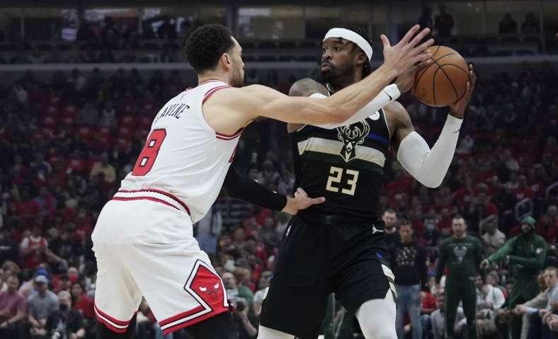 Apr 24, 2022; Chicago, Illinois, USA; Chicago Bulls guard Zach LaVine (8) defends Milwaukee Bucks guard Wesley Matthews (23) in the first half during game four of the first round for the 2022 NBA playoffs at United Center. Mandatory Credit: David Banks-USA TODAY Sports