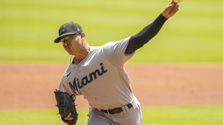 Apr 24, 2022; Cumberland, Georgia, USA; starting pitcher Jesus Luzardo (44) pitches against the Atlanta Braves during the first inning at Truist Park. Mandatory Credit: Dale Zanine-USA TODAY Sports
